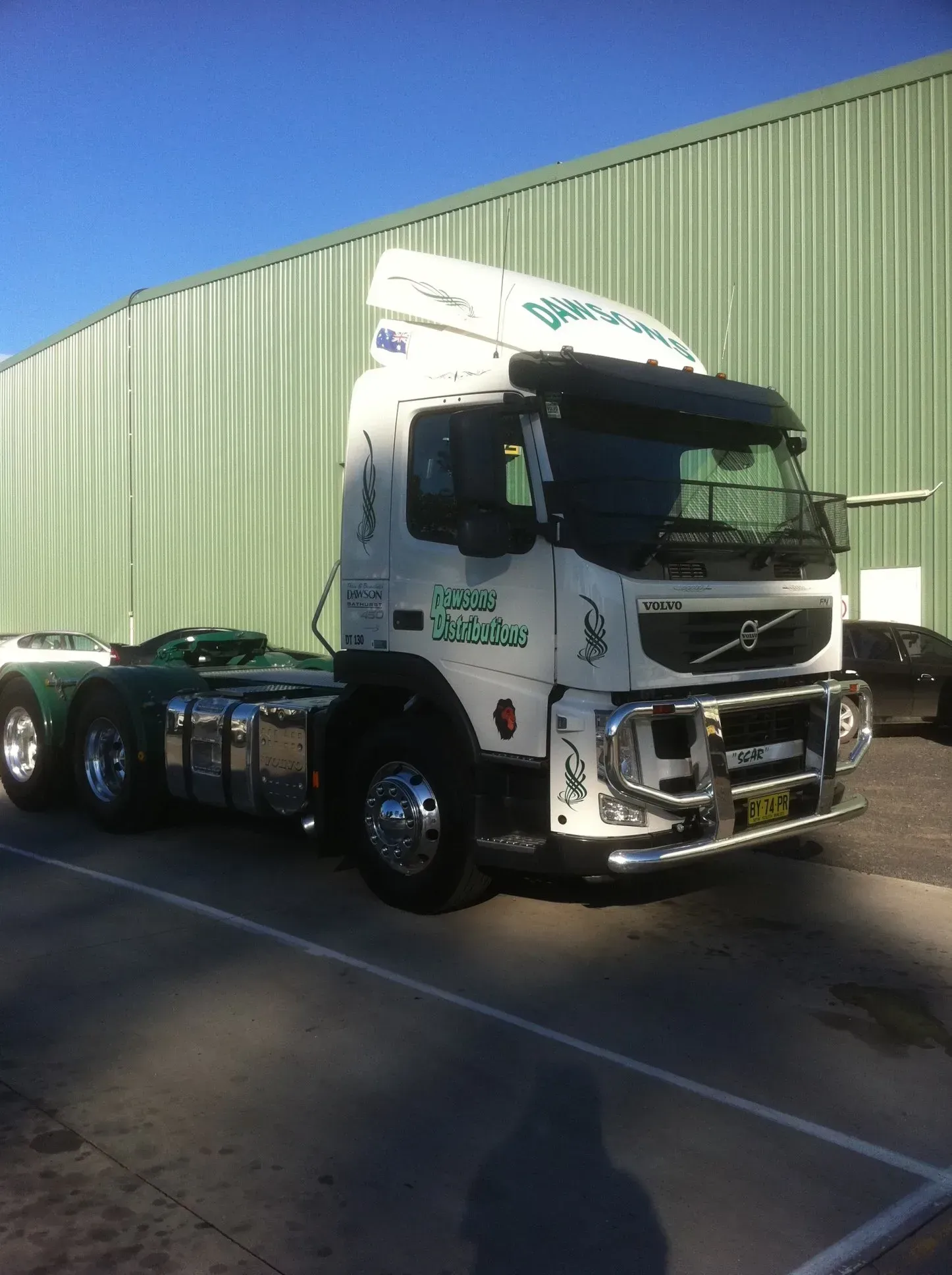 White Volvo Semi-truck With Green Details — Dawson's Removals In Kelso, NSW