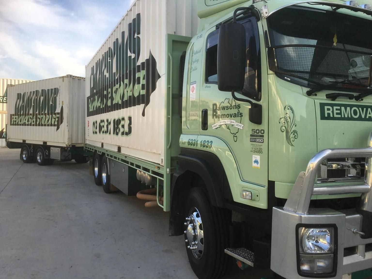 Green Truck With Two Connected White Containers — Dawson's Removals In Kelso, NSW