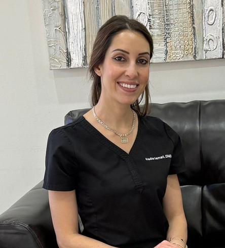Dr. Ismail wearing a stethoscope around her neck smiles for the camera