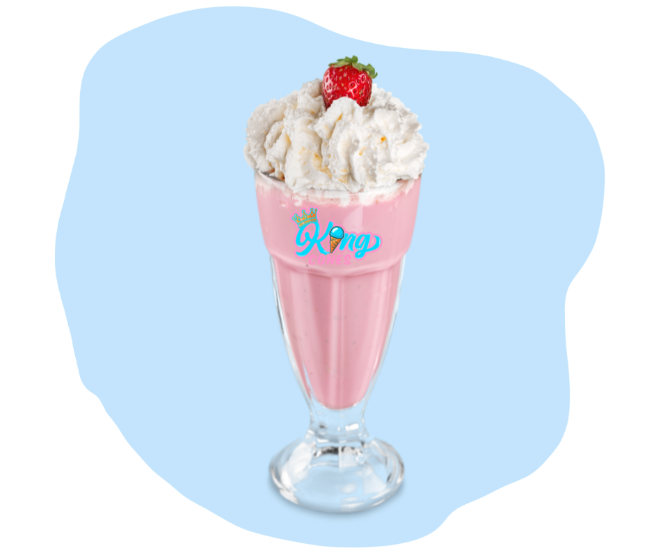 A pink strawberry milkshake topped with whipped cream and a strawberry in a glass, set against a soft blue background.