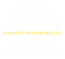 Logo for Domestic Woodworks, featuring an outline of a house roof, a hand plane tool, and the text "EST 2021."