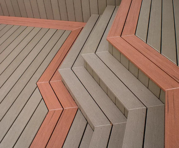 “Close-up of patterned composite deck boards with contrasting trim installed by deck builders in Allentown, PA”