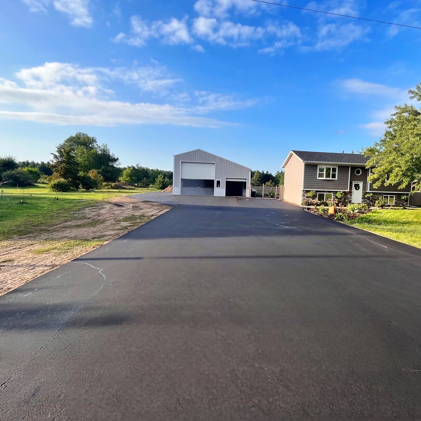 residential house with wide concrete driveway
