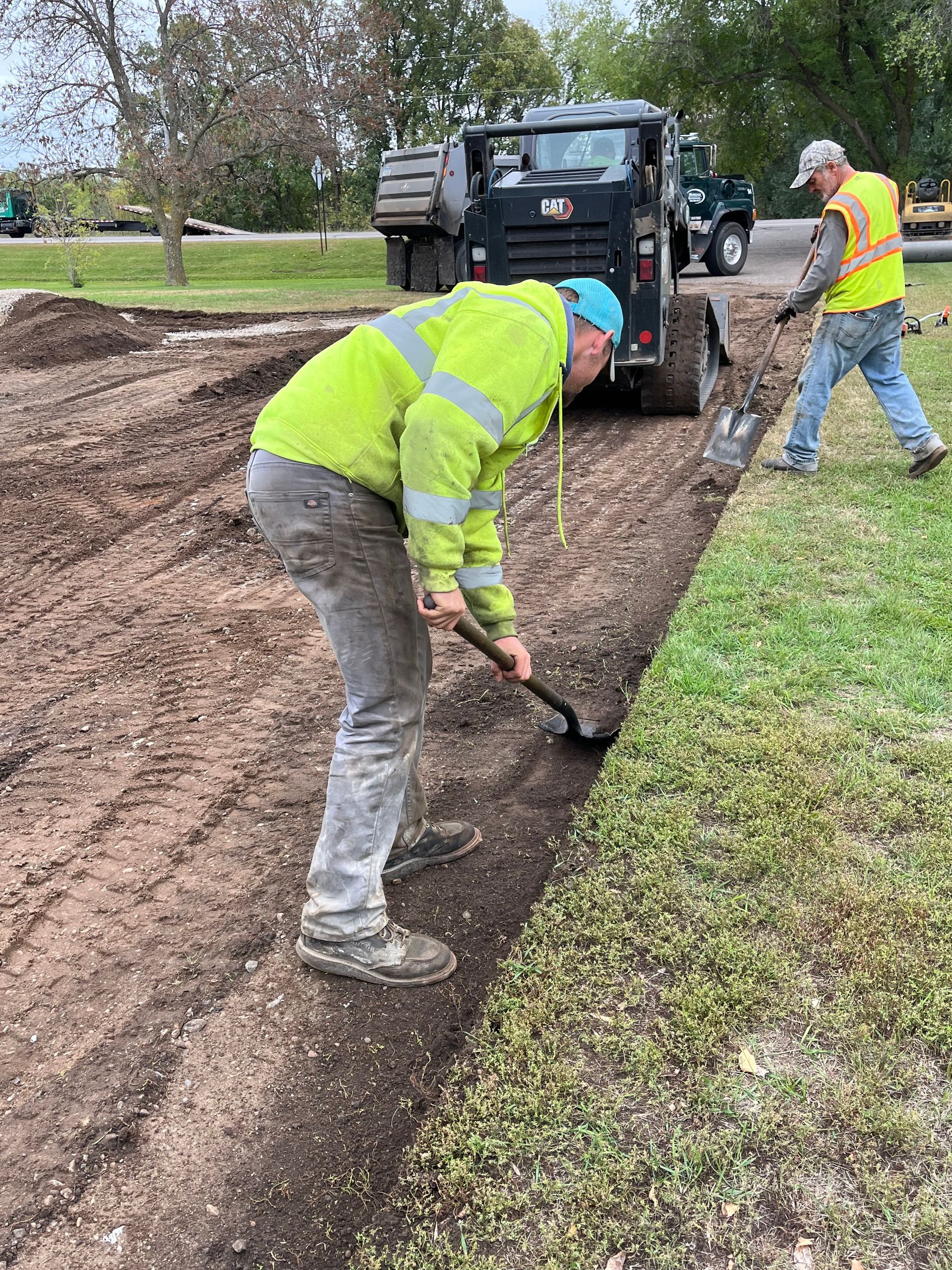 a man digging in the soil