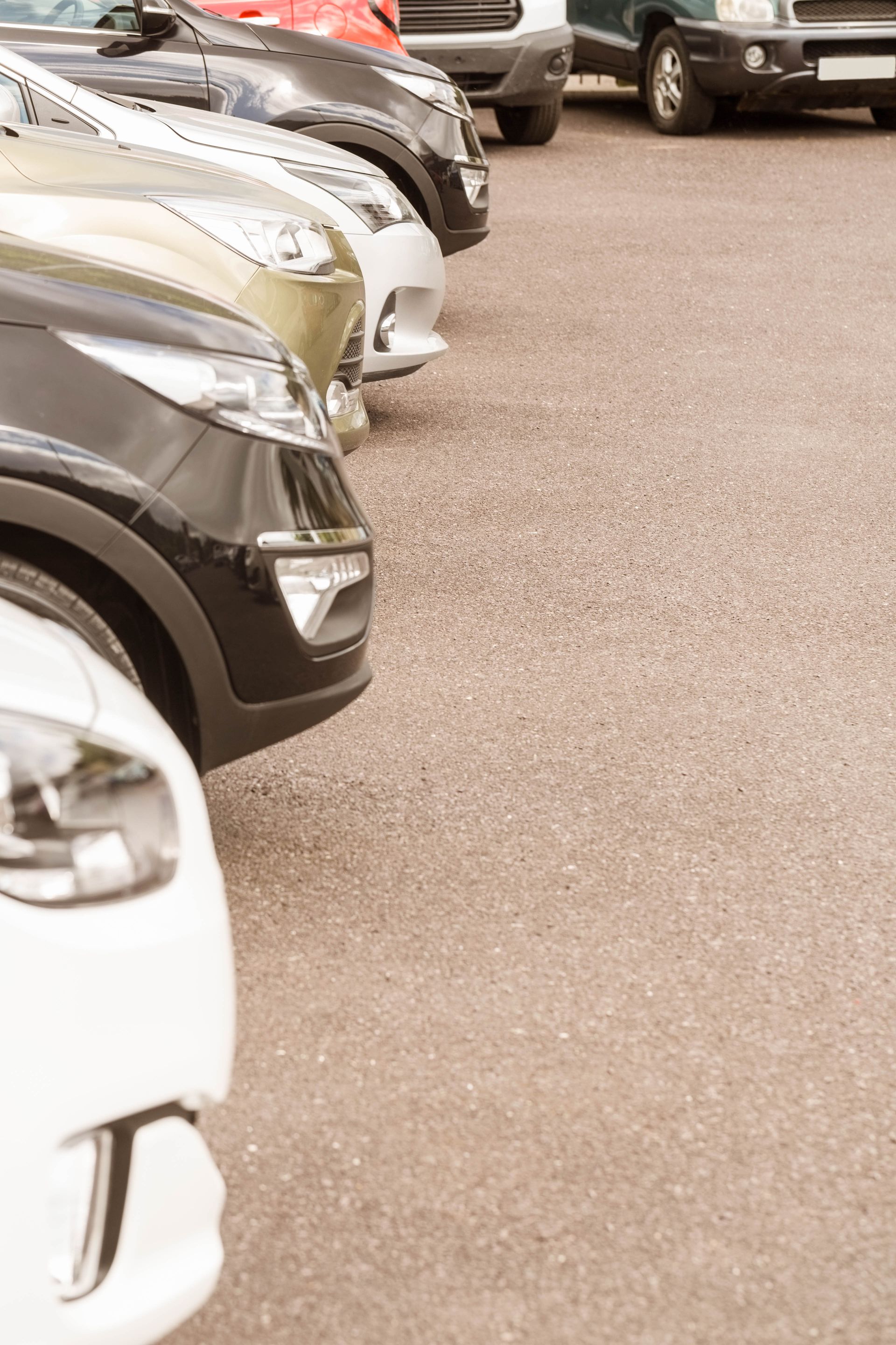 a parking lot with cars