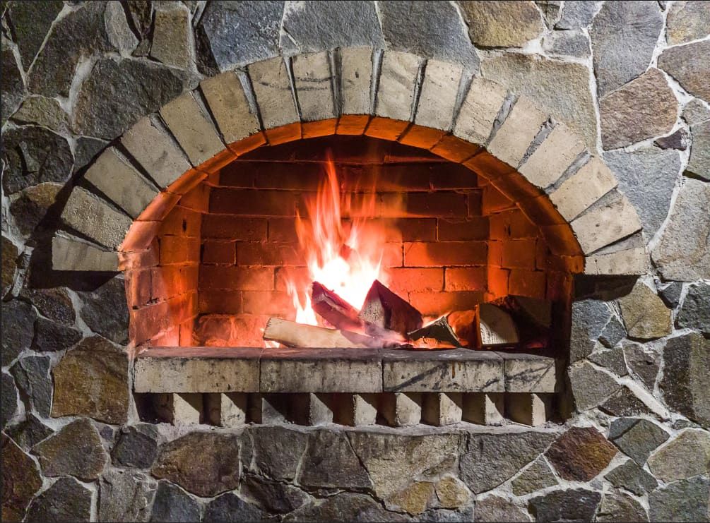 A Woodfire Installed Inside the House — Nathan Parnell Roofing In Vincentia, NSW