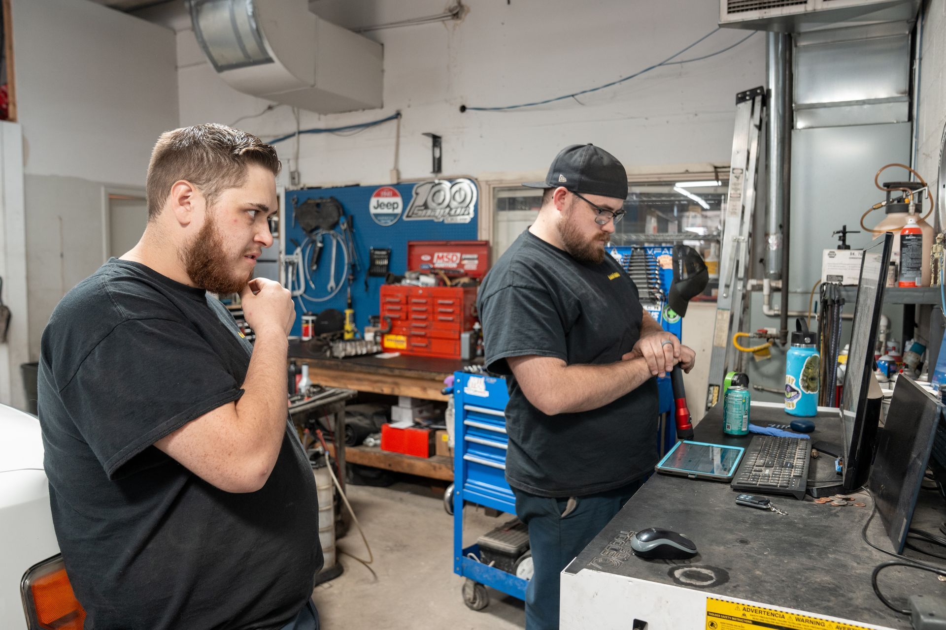 Two Mechanics Working | AutoSport