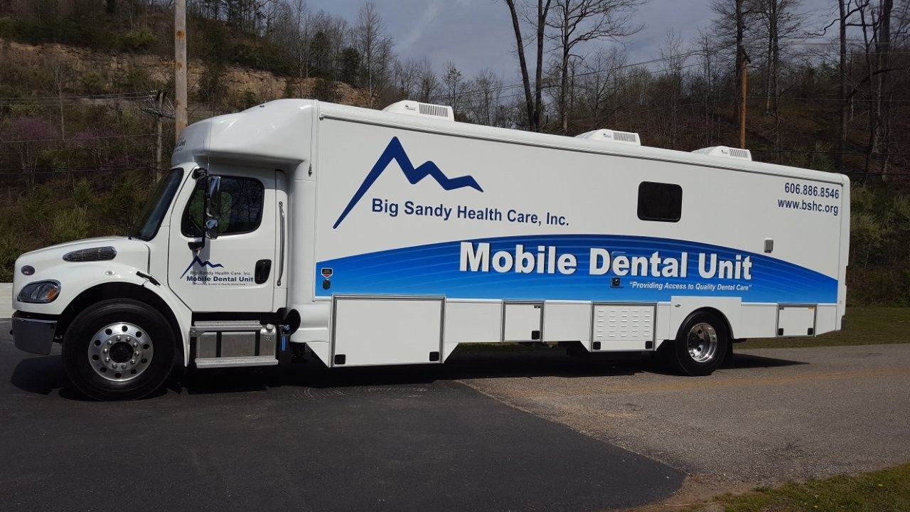 White Big Sandy Health Care mobile dental unit truck parked outdoors on a road