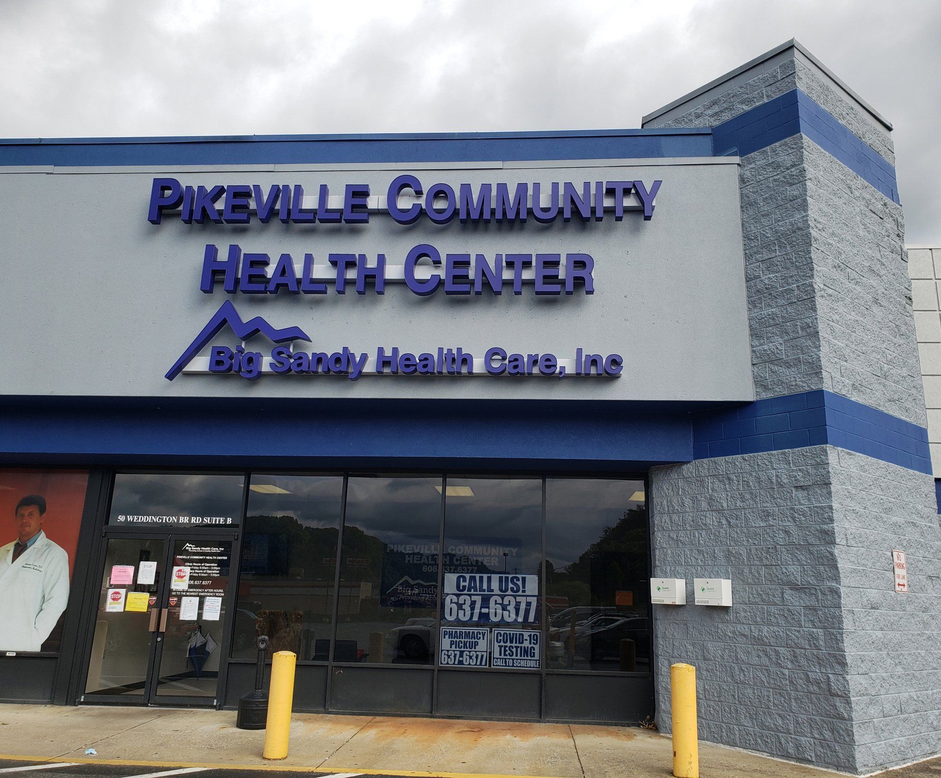 Pikeville Community Health Center storefront with blue-gray exterior and glass entrance