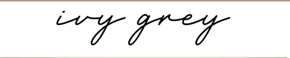 Stylized black script text reading “ivy grey” on a white background.
