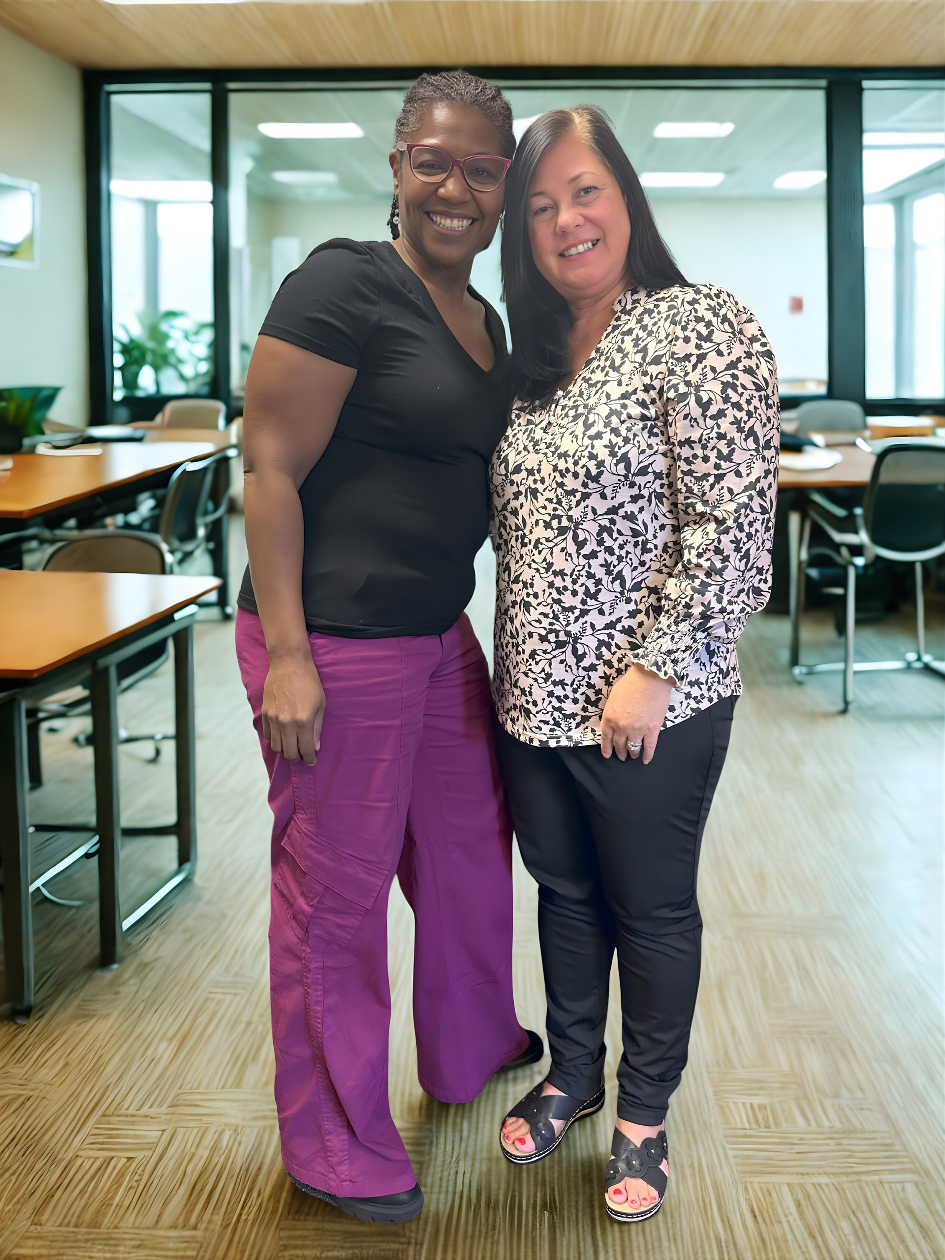 R. Folice Bailey with school administrator during leadership development engagement