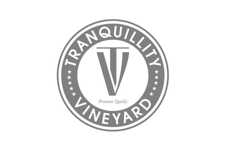 Tranquillity Vineyard logo. Gray circle with text, centered