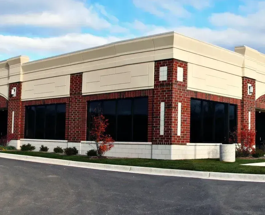 A large brick building with a lot of windows