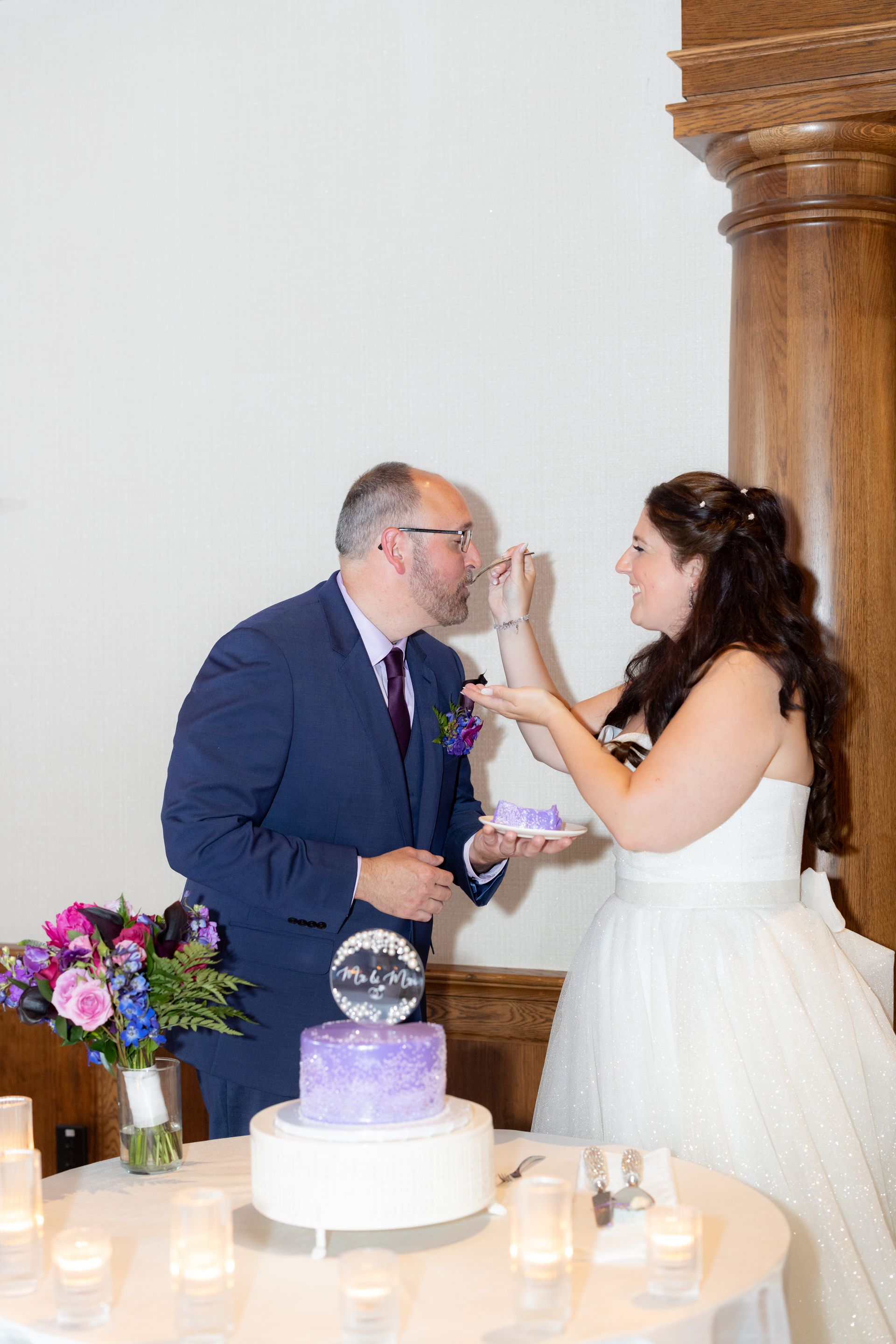 Ashley & Shaun cutting their wedding  cake at The Starting Gate at GreatHorse