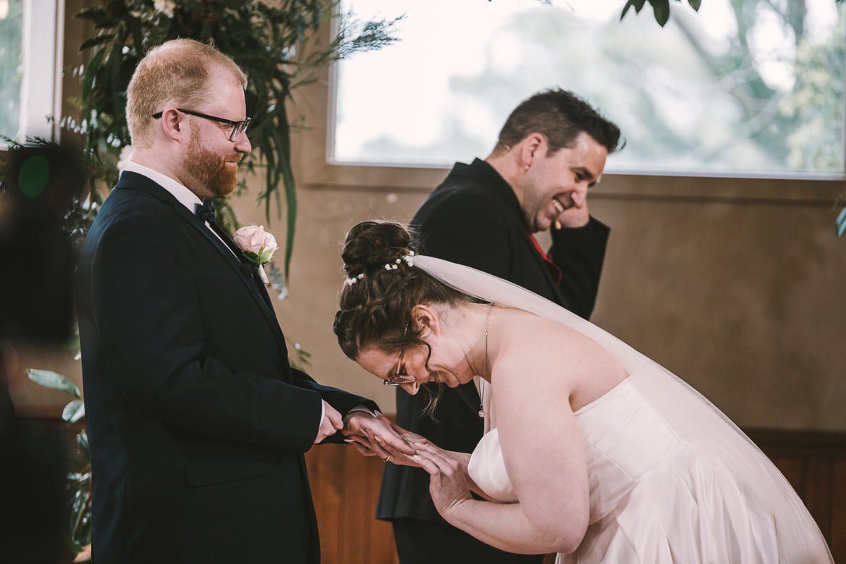 A bride and groom are getting married in a church.