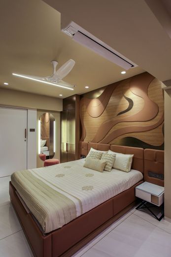 Modern bedroom with a bed, ceiling fan, recessed lights, and a decorative wall mural