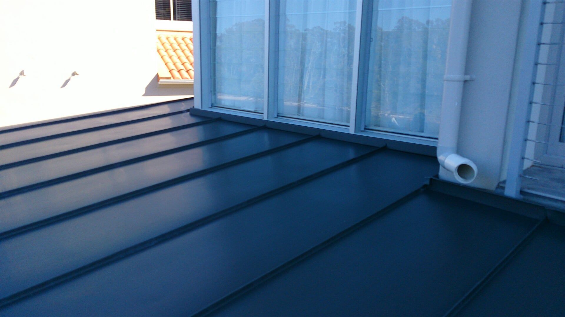 Rheinzink Graphite Grey in Double Standing Seam System