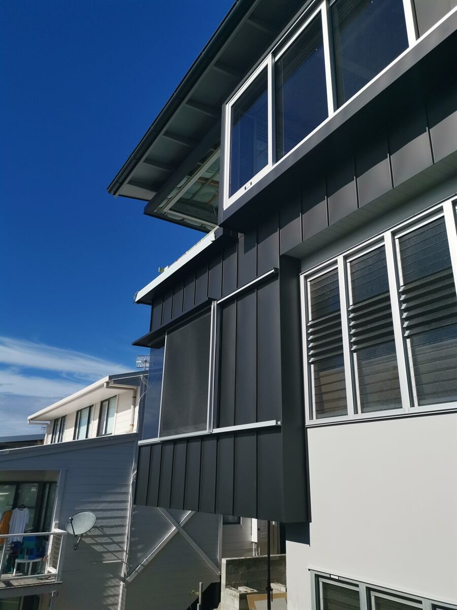 Wall Cladding in Angle Standing Seam System in Matt Black Prefa Aluminium