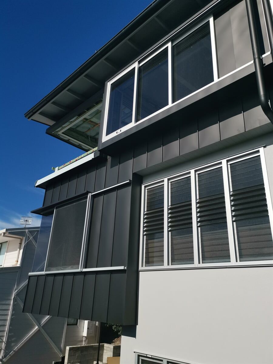 Wall Cladding in Angel Standing Seam System in Matt Black Prefa Aluminium