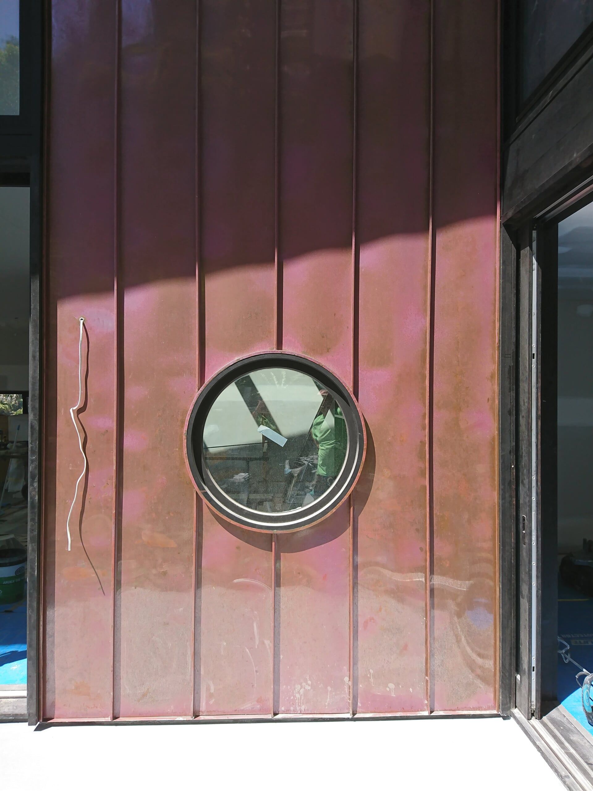 Angle Standing Seam with Round Window