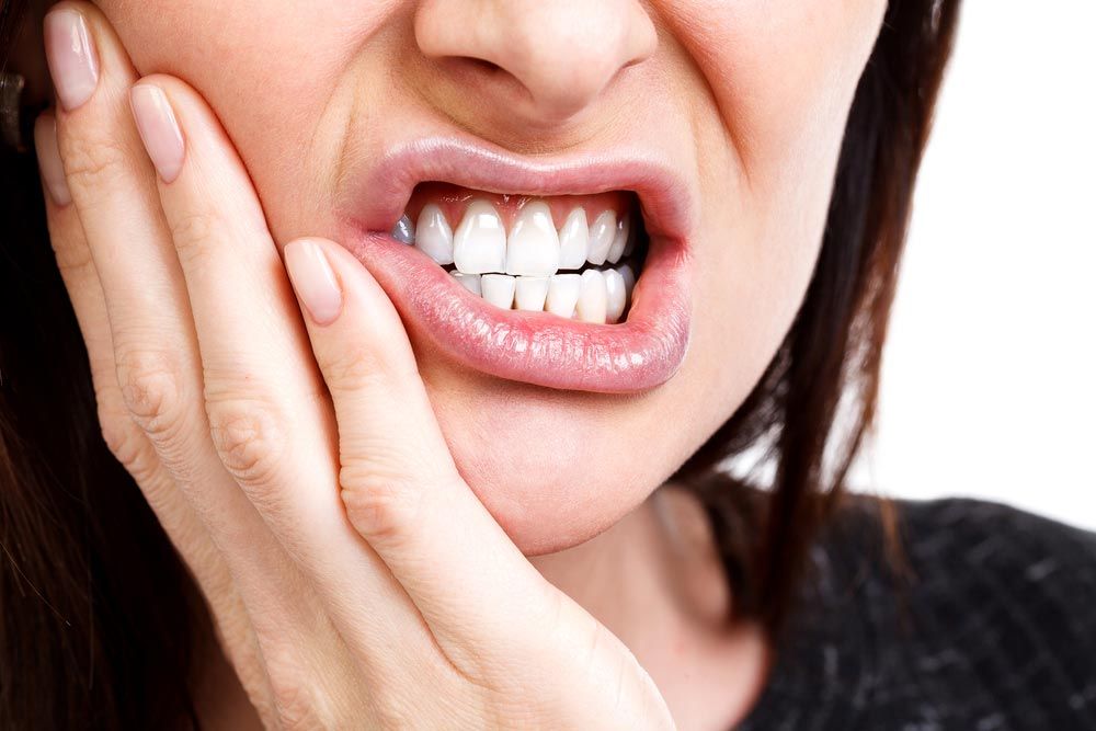 Woman Suffering From Toothache