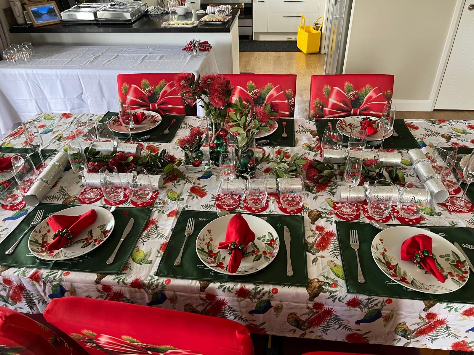 Dining table and chairs decorated for a Christmas feast