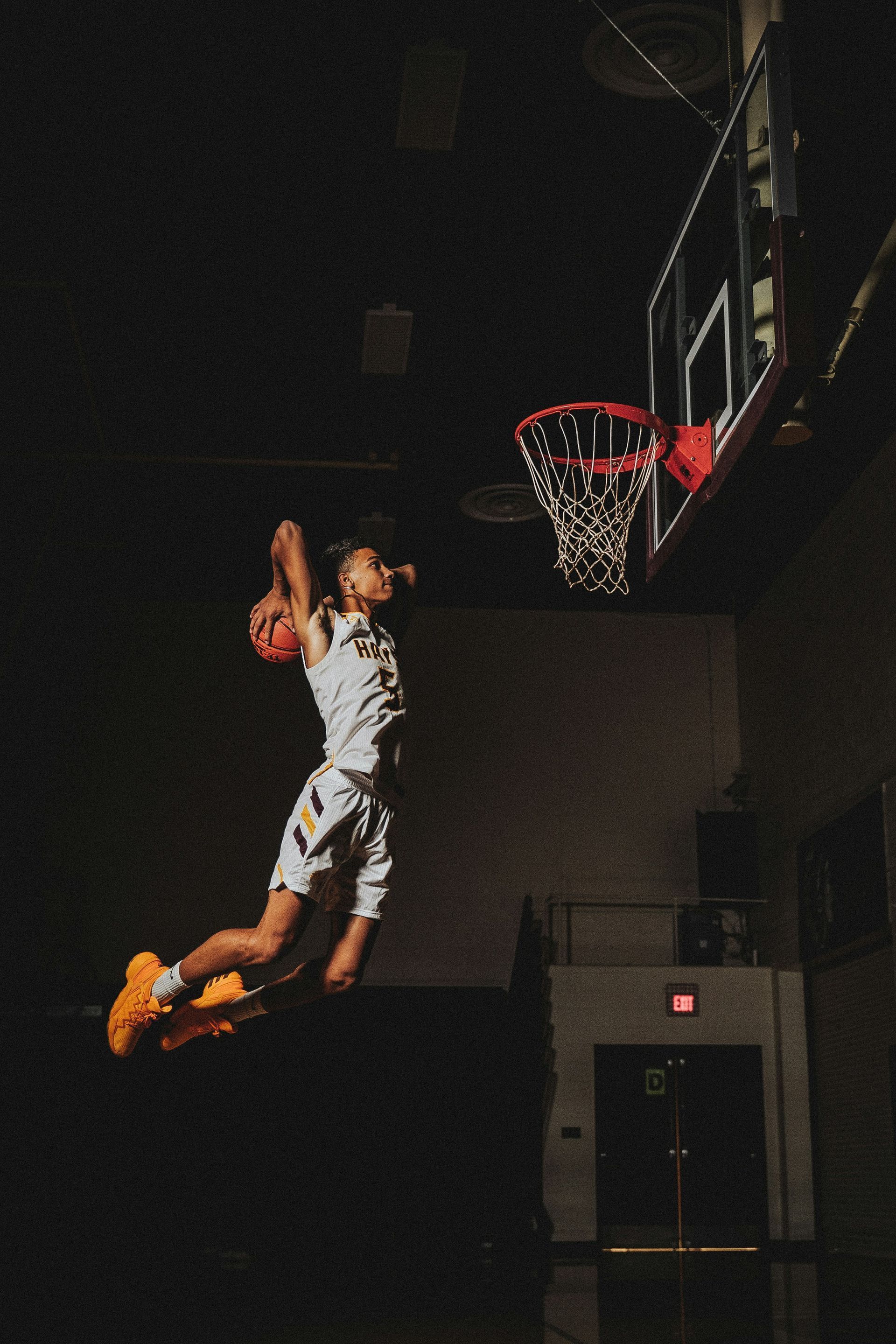 Young basketballer leaps to the hoop