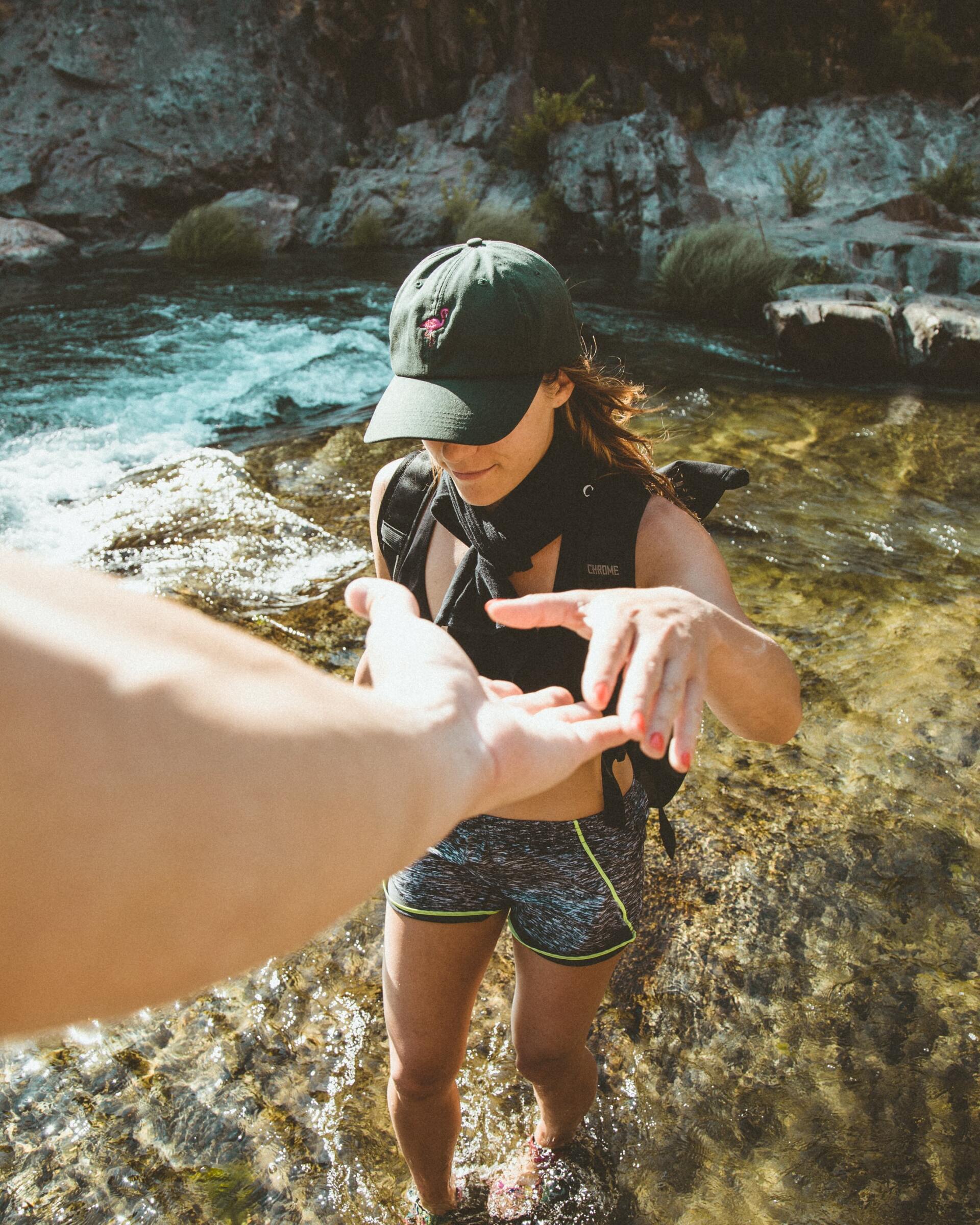 Hand outstretched to assist hiker