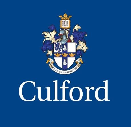Culford school logo on blue background, with crest above the word “Culford”