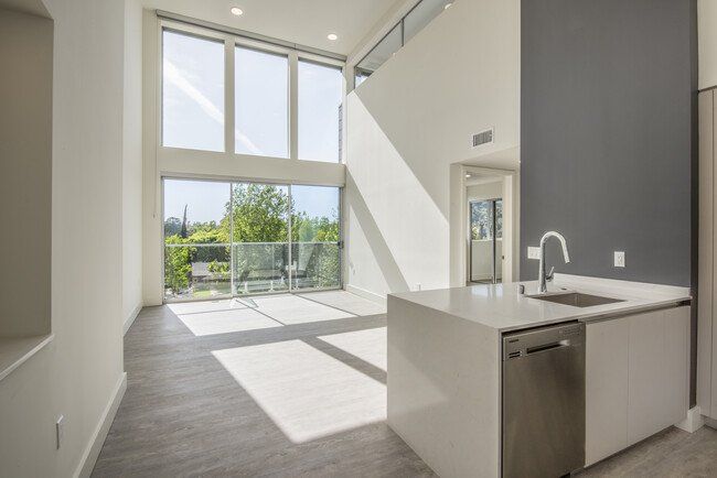 12117 Valleyheart Drive Living Room Photo With Large Window
