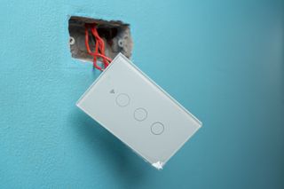 Electrician installing a smart home device, Sonoma, CA