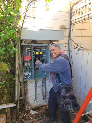 Electrician upgrading an electrical panel, Sonoma, CA