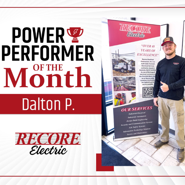 Power Performer of the Month for Dalton P. with a Recore Electric banner and smiling man by display booth