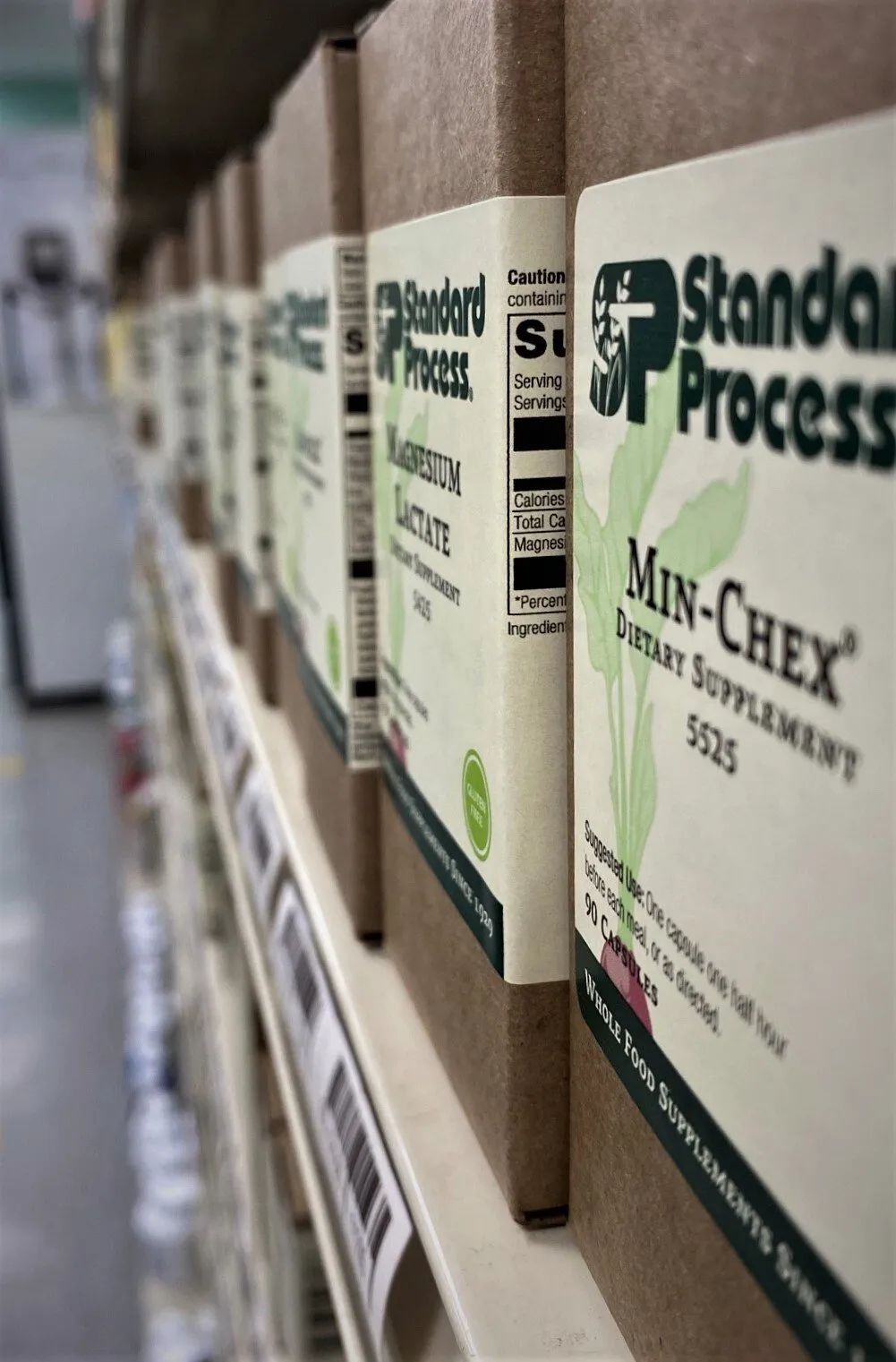 A Shelf With Boxes of Min-chex on It
