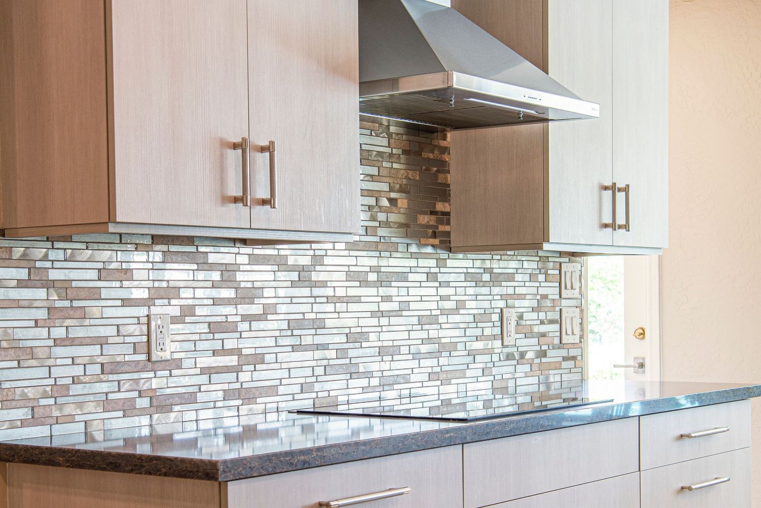 Tile installation professional working in Bexar County home