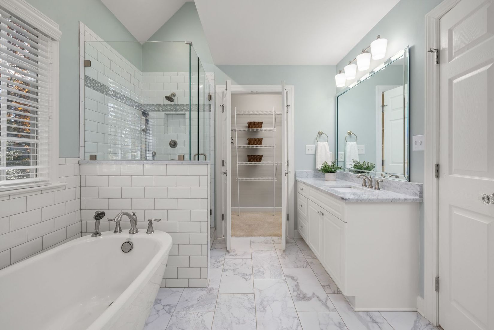 Updated bathroom with professional grouting and caulking in San Antonio