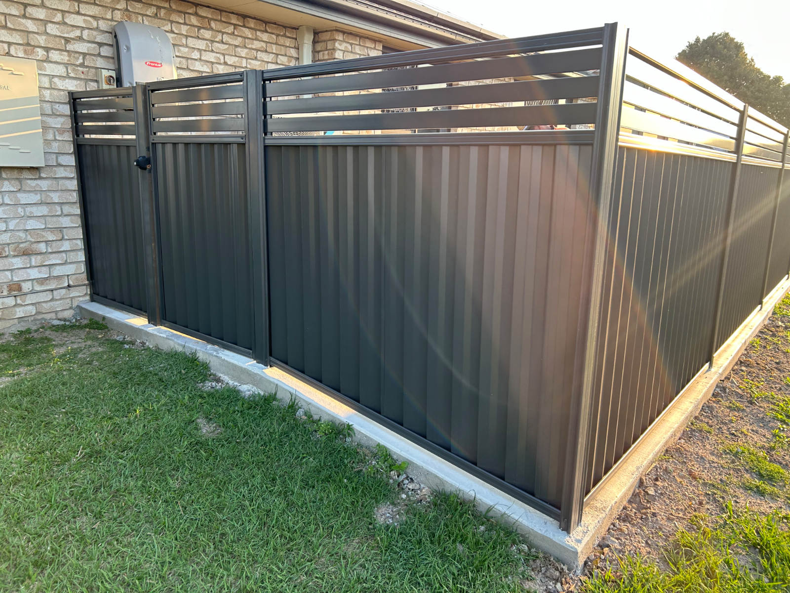 Green Corrugated Metal Fence — Western Pacific Steel in South Grafton, NSW