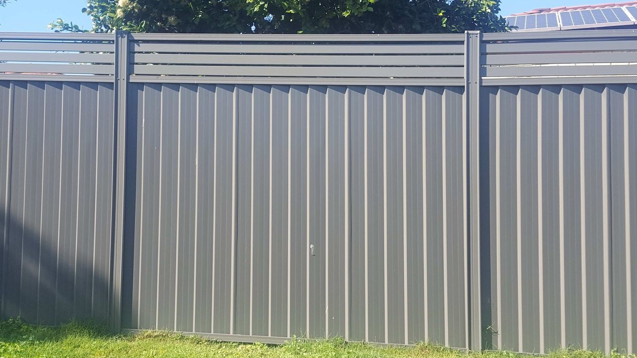Green Corrugated Metal Fence — Western Pacific Steel in South Grafton, NSW