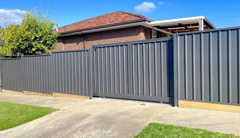 Tall, Metallic Security Fence With Razor Wire — Western Pacific Steel in South Grafton, NSW