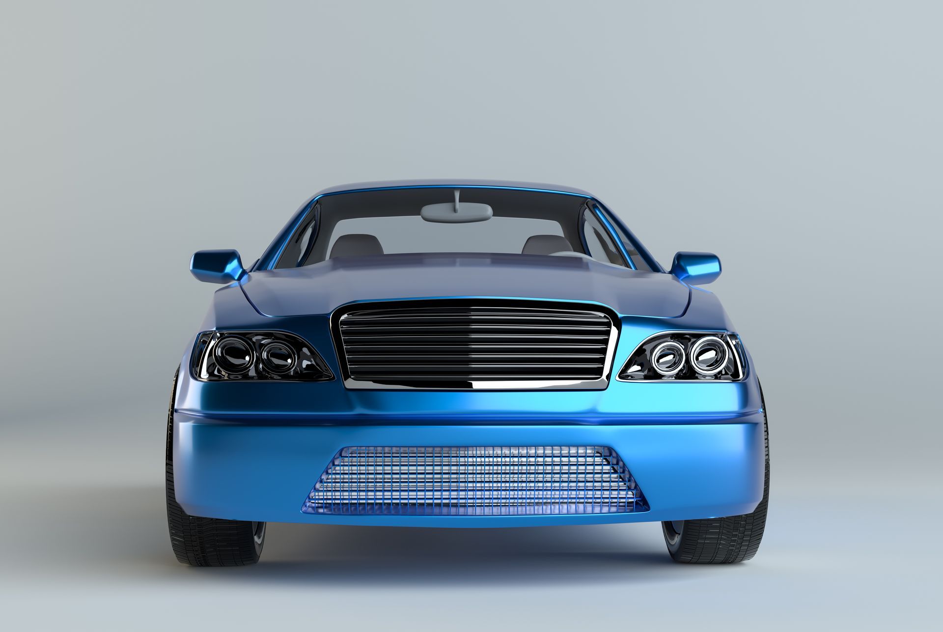 Blue sedan, head-on view, chrome grille, against a light grey background.