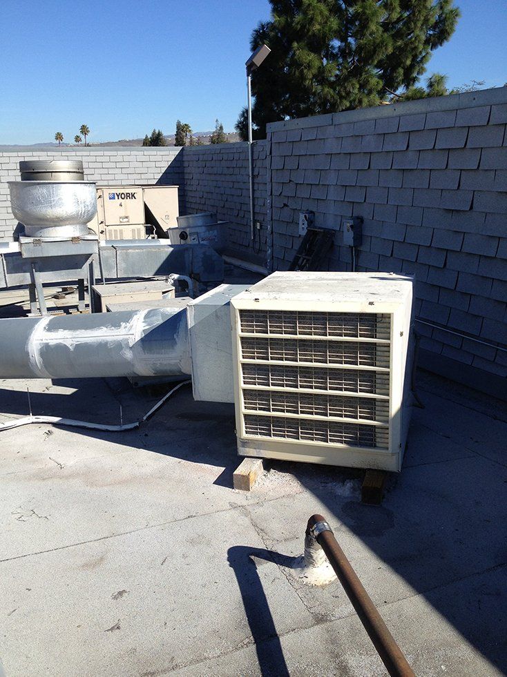 Outdoor Aircon On Roof — Campbell, CA — JWH Asbestos Removal Services
