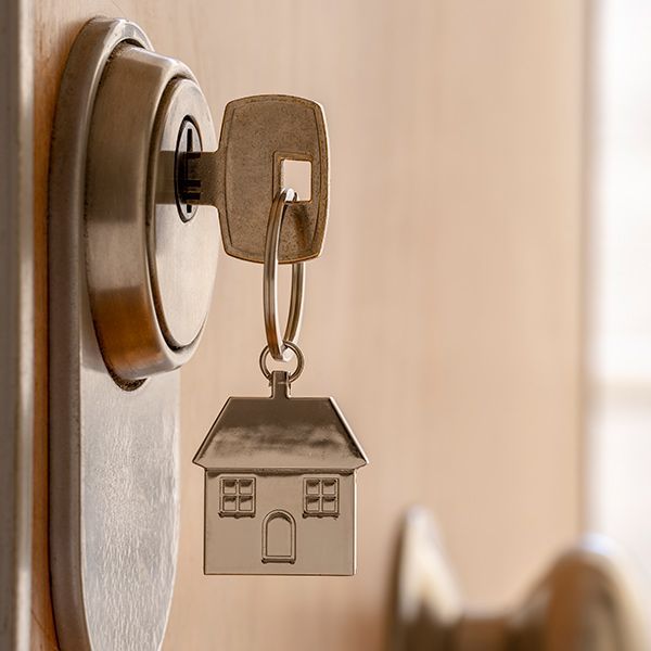 close up of key in door