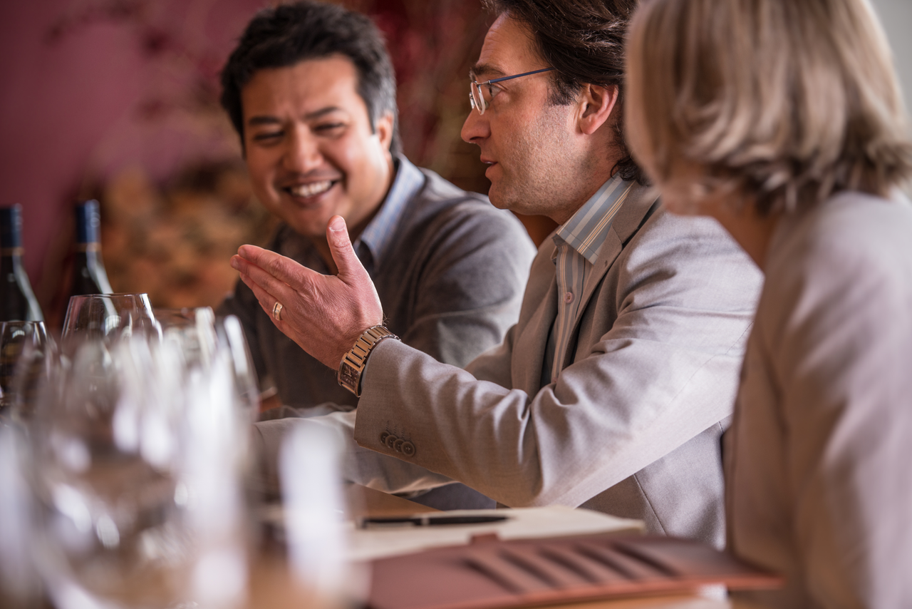 A group of people are sitting at a table