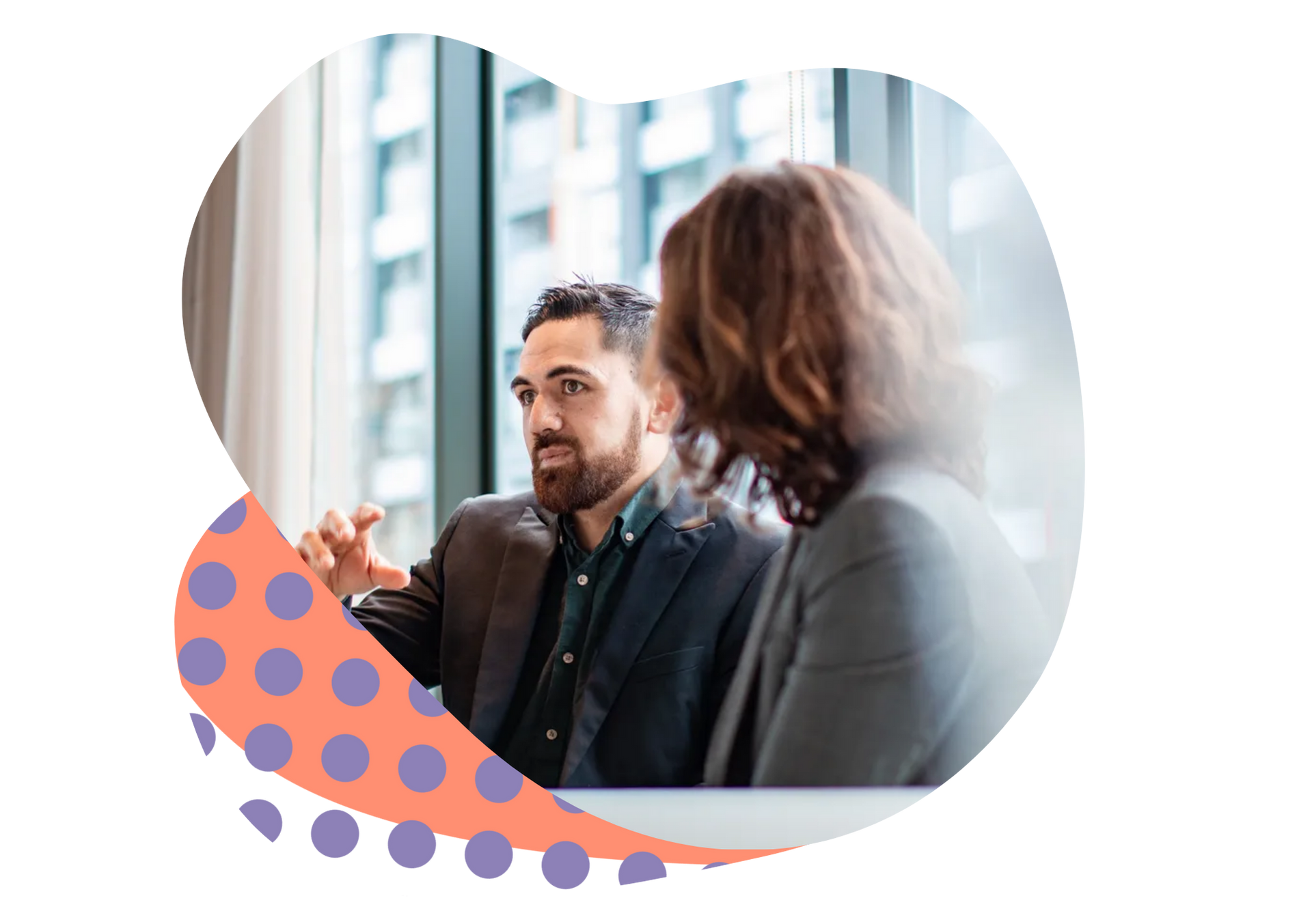 Two people in a bright office discussing, with a purple and orange dotted graphic overlay