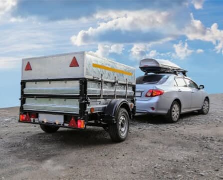 Trailer Attached To Car — Joe’s Auto Service Centre in Forster, NSW