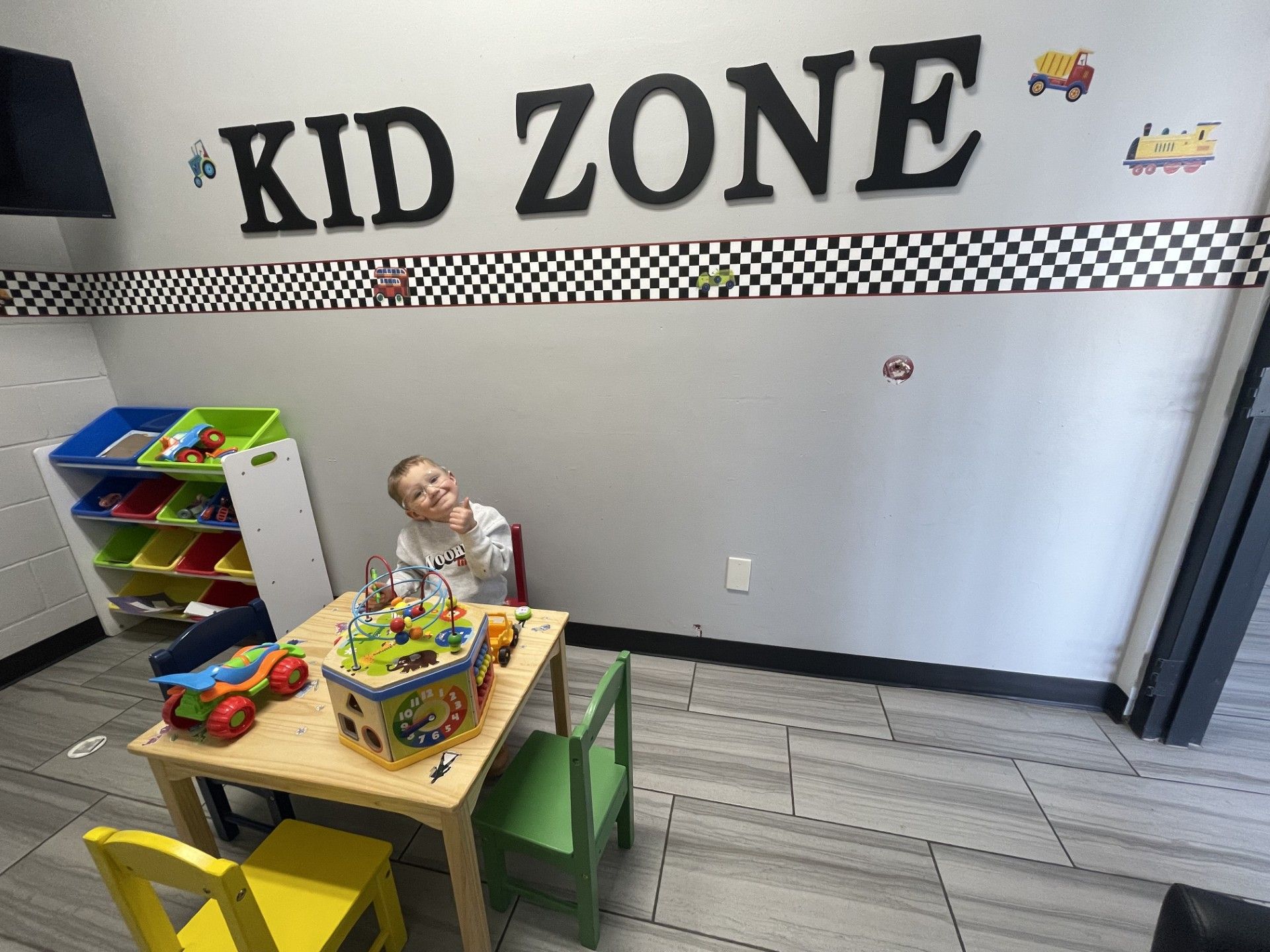A kid smiling in a 