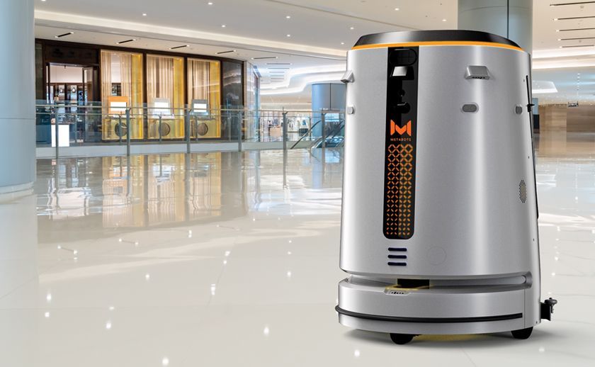 A robot is cleaning the floor of a building.