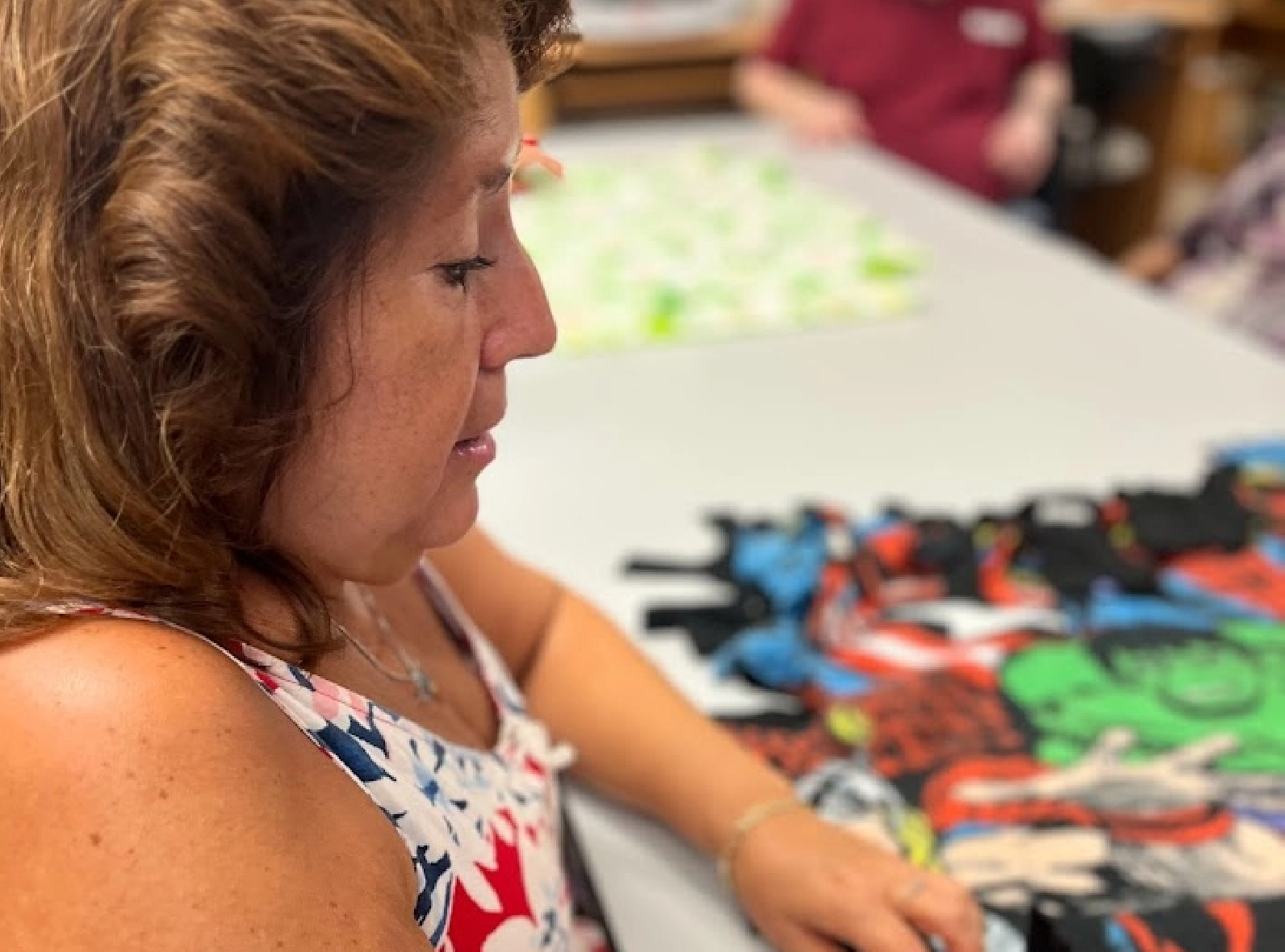 Woman attending a craft class.
