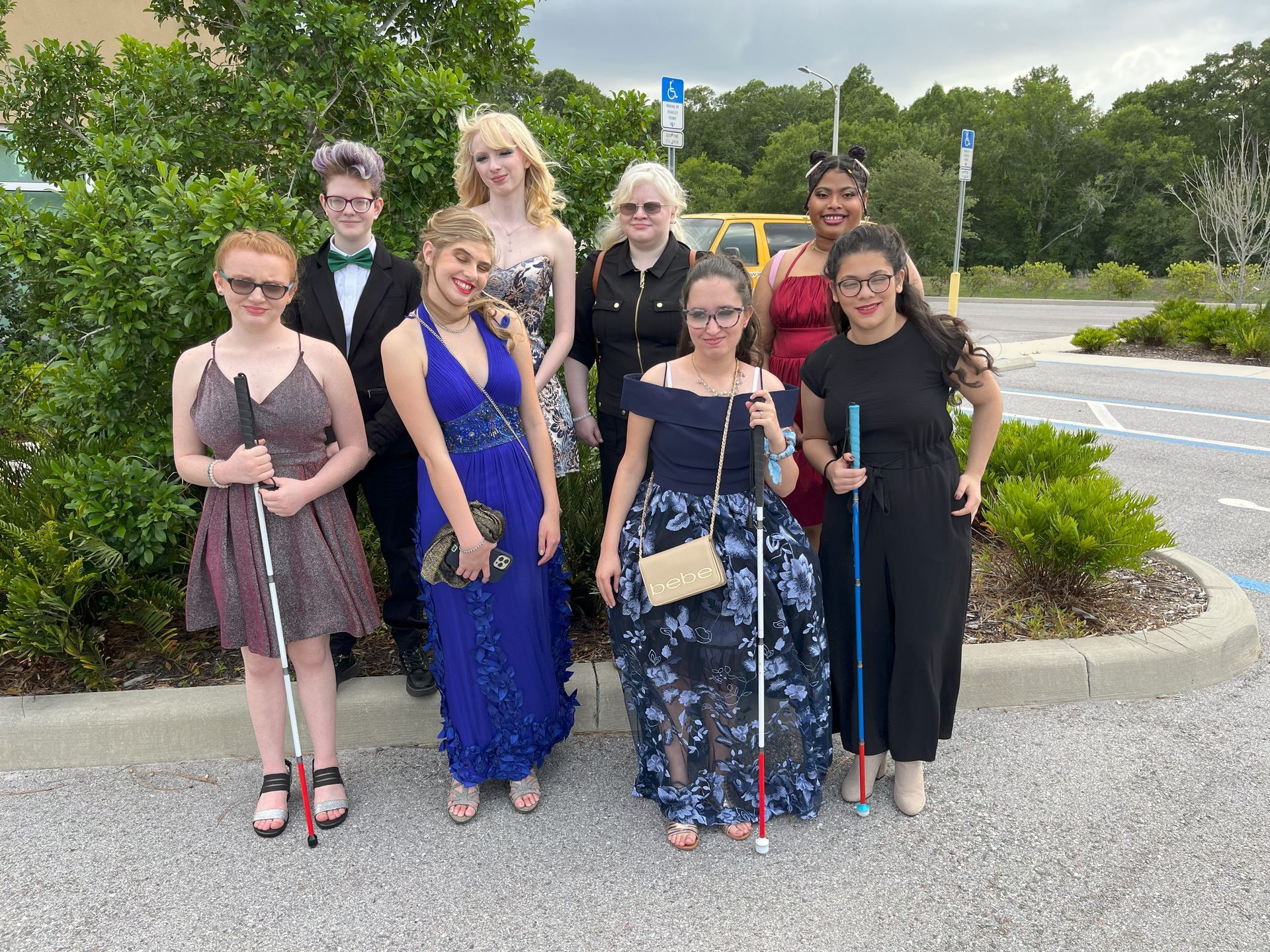 Teens all dressed up and ready to attend prom.