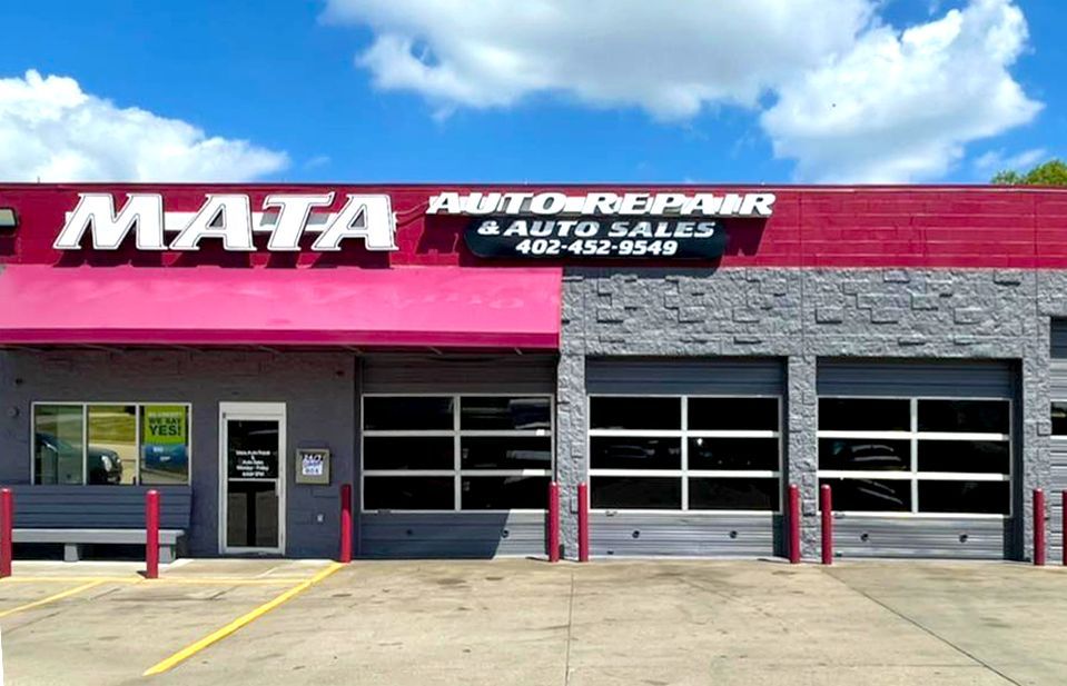 The front of a mata auto repair and auto sales store